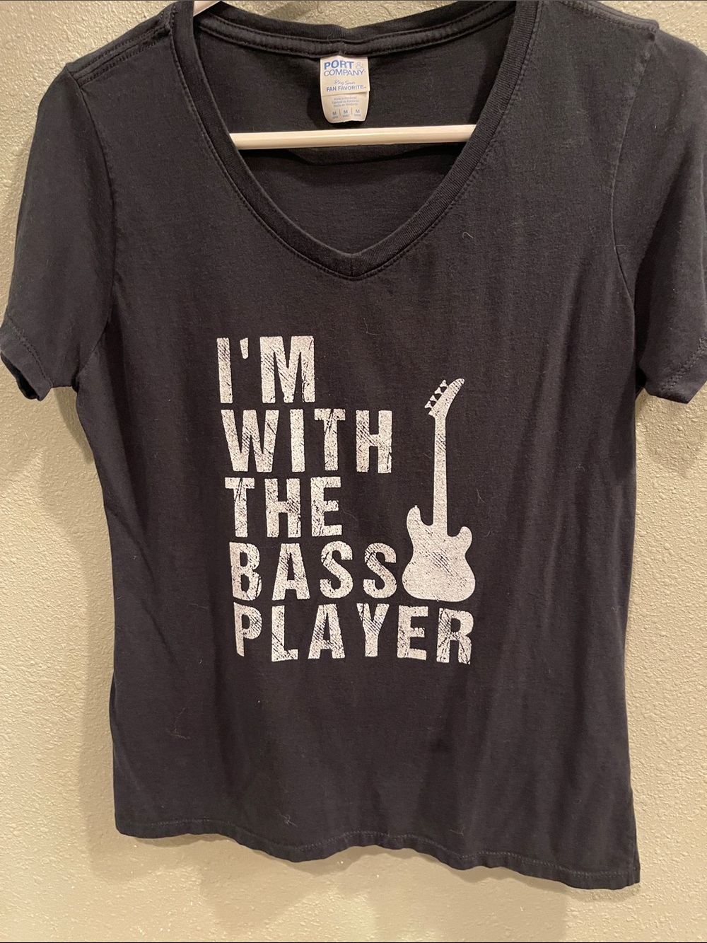 Port and Company Black V-Neck Tee with White Bass Player Graphic
